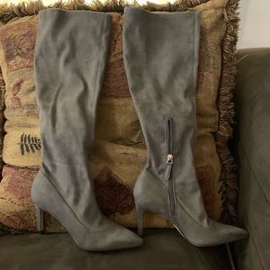 Below the knee high heels boots